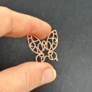 metal frame buterfly with star pattern rose gold